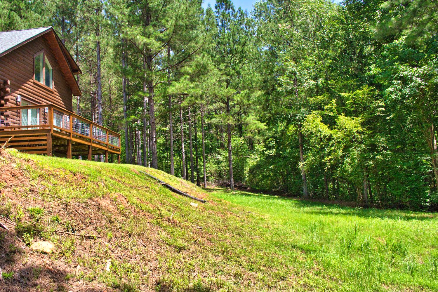 MLS # 4283344 | 2.00 acres | New log cabin w/stream in gated Hearthstone Ridge