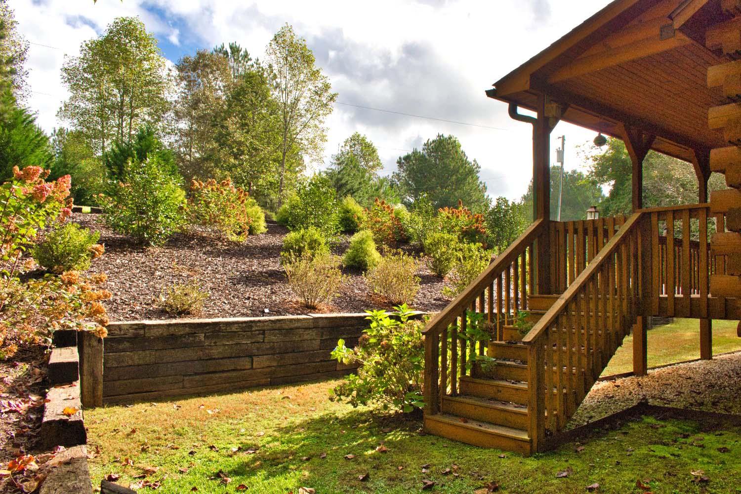 MLS #4309990 | 3.03 acres | Log cabin w/creek frontage in gated Hearthstone Ridge