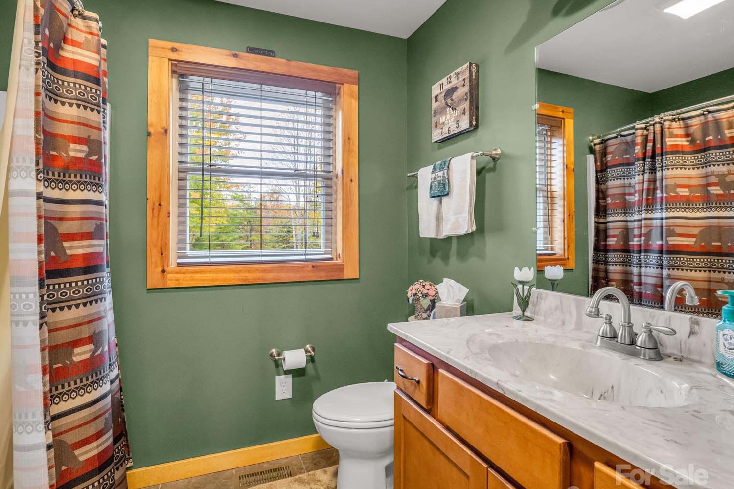 MLS # 4317464 | 4.60 acres | Cabin w/barn in gated Hearthstone Ridge