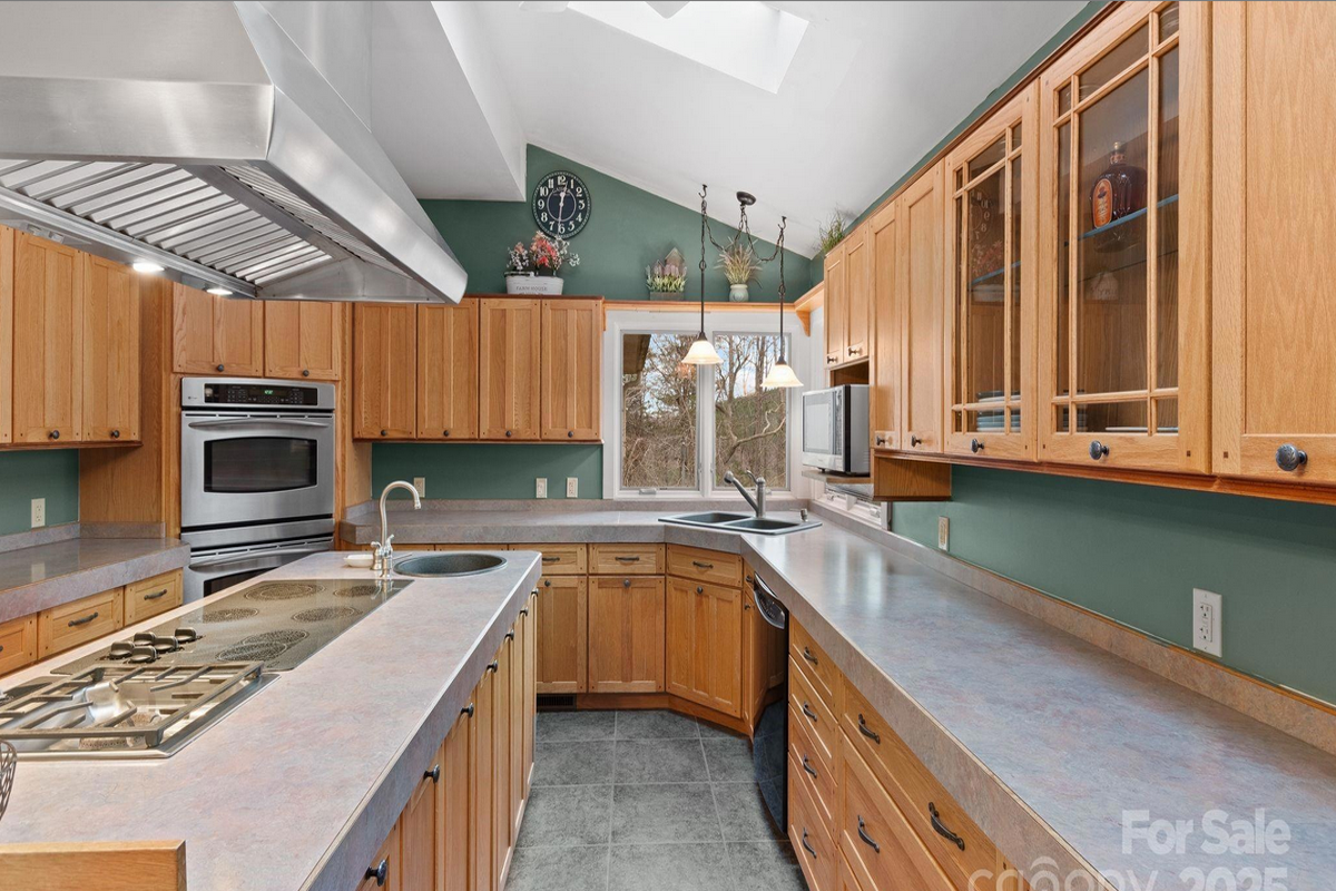 17 acres of pasture, creek, stables, barn, garage, and large 4,579 sq ft home